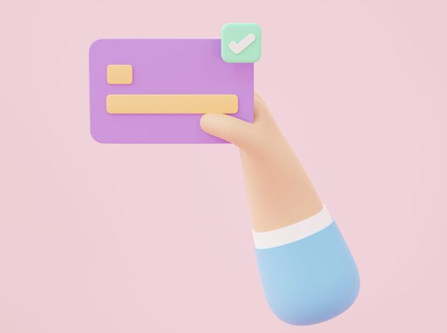 hand-holding-and-using-credit-card-for-payment-online-shopping-on-pink-background-3d-rendering-e1652778558508