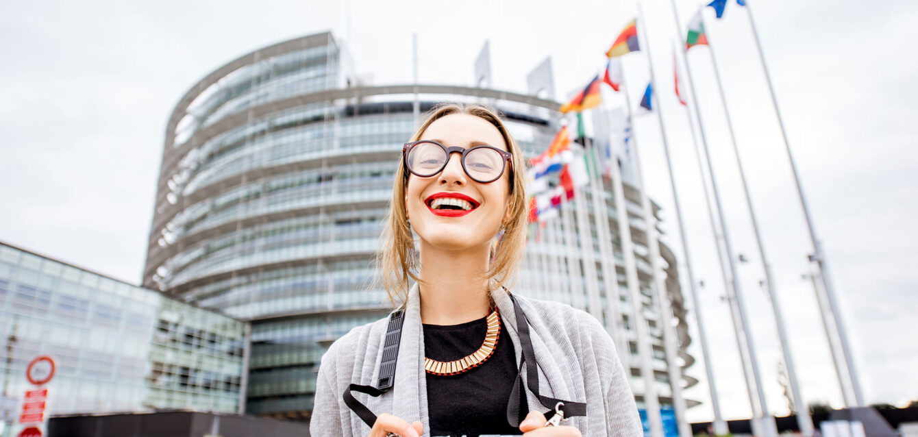 woman-near-the-european-parliament-building-in-str-2025-03-14-00-42-11-utc
