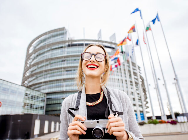 woman-near-the-european-parliament-building-in-str-2025-03-14-00-42-11-utc