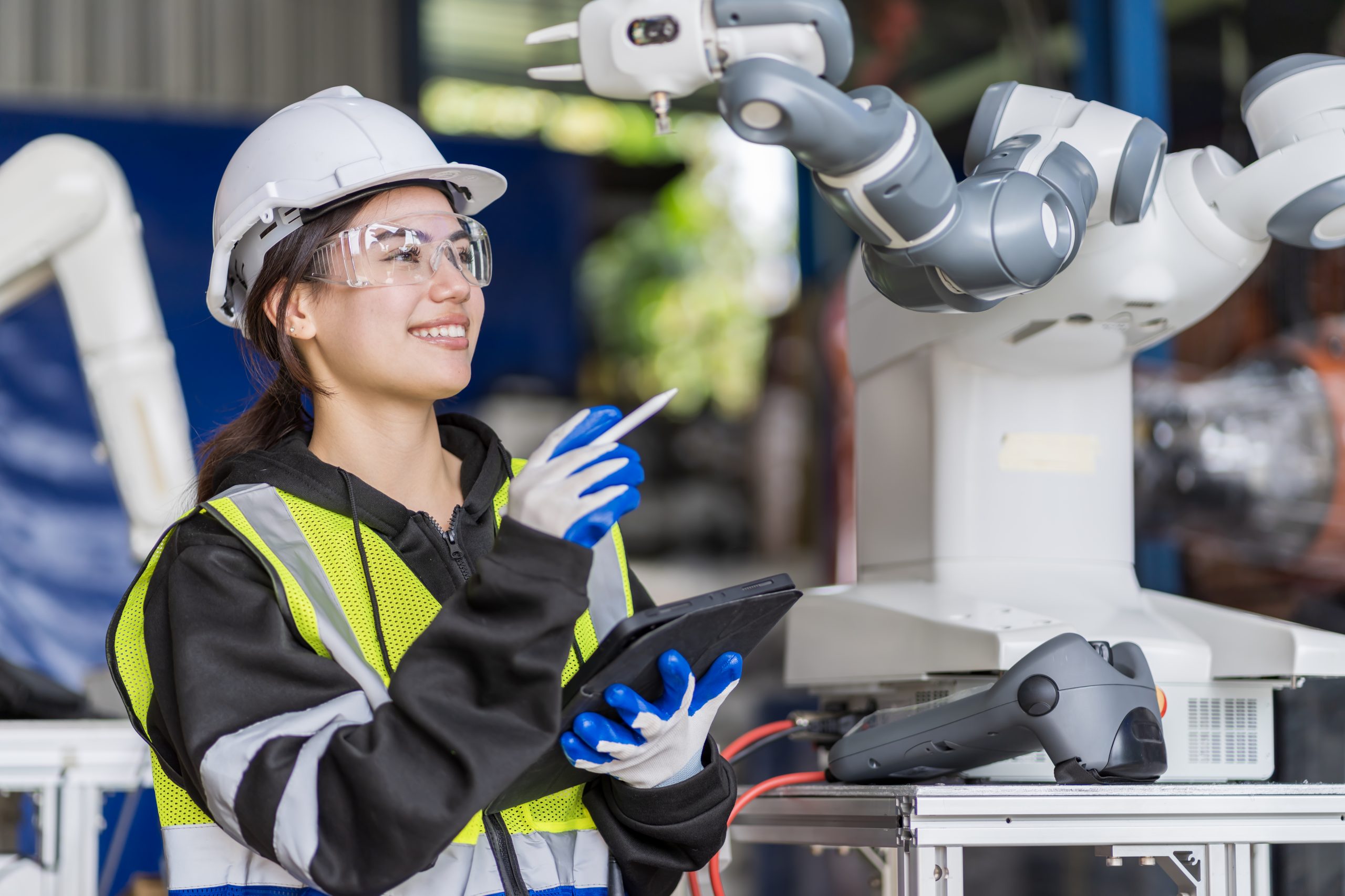 A team of female engineers meeting to inspect computer-controlle